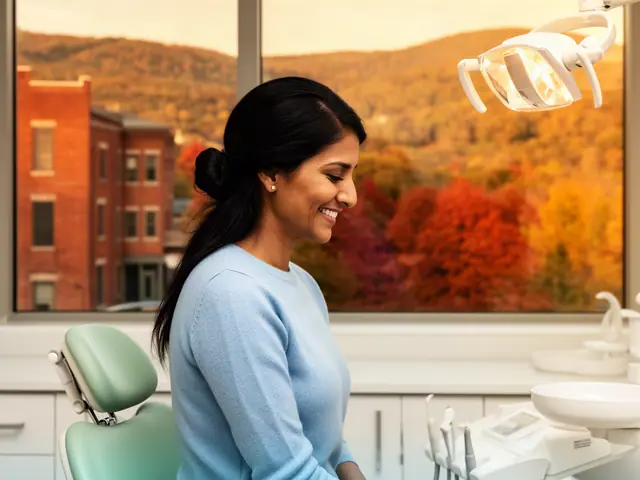 A dentist standing beside a dental chair.